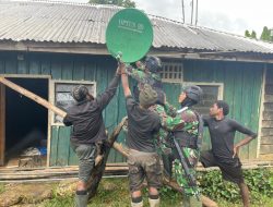 Satgas Yonif Raider 321/GT Berikan Bantuan Pemasangan TV dan Instalasi Parabola Warga Distrik Mbua