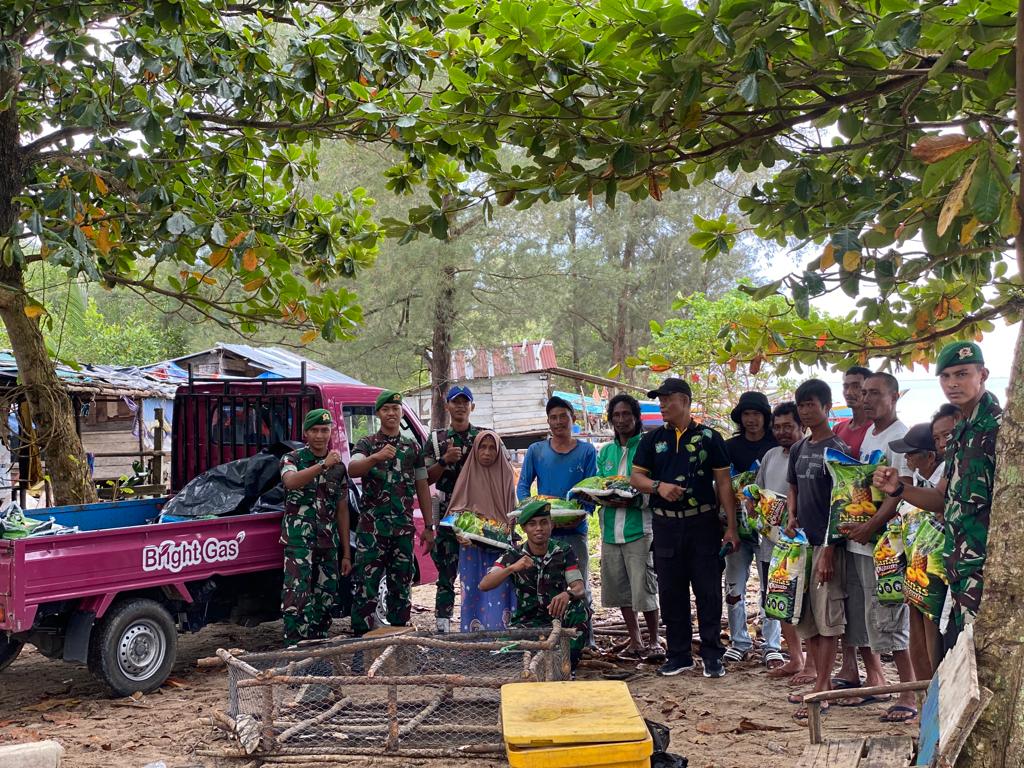 Bakti Sosial Yonif 147/KGJ Membantu Masyarakat Kurang Mampu